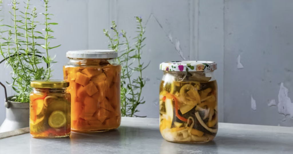 jars of fermented foods from the book The Art of Fermentation